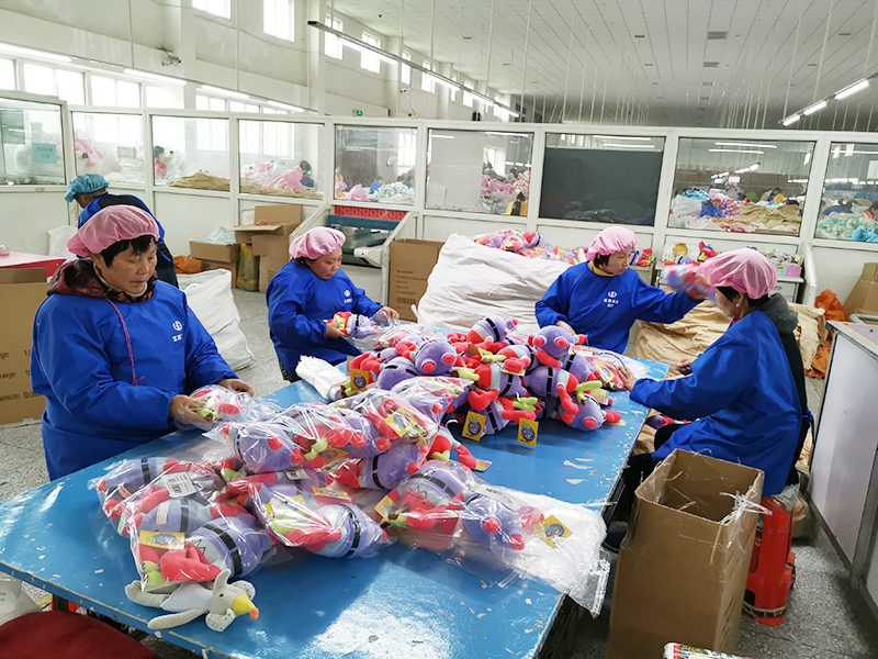 Packing line preparing cartons for export