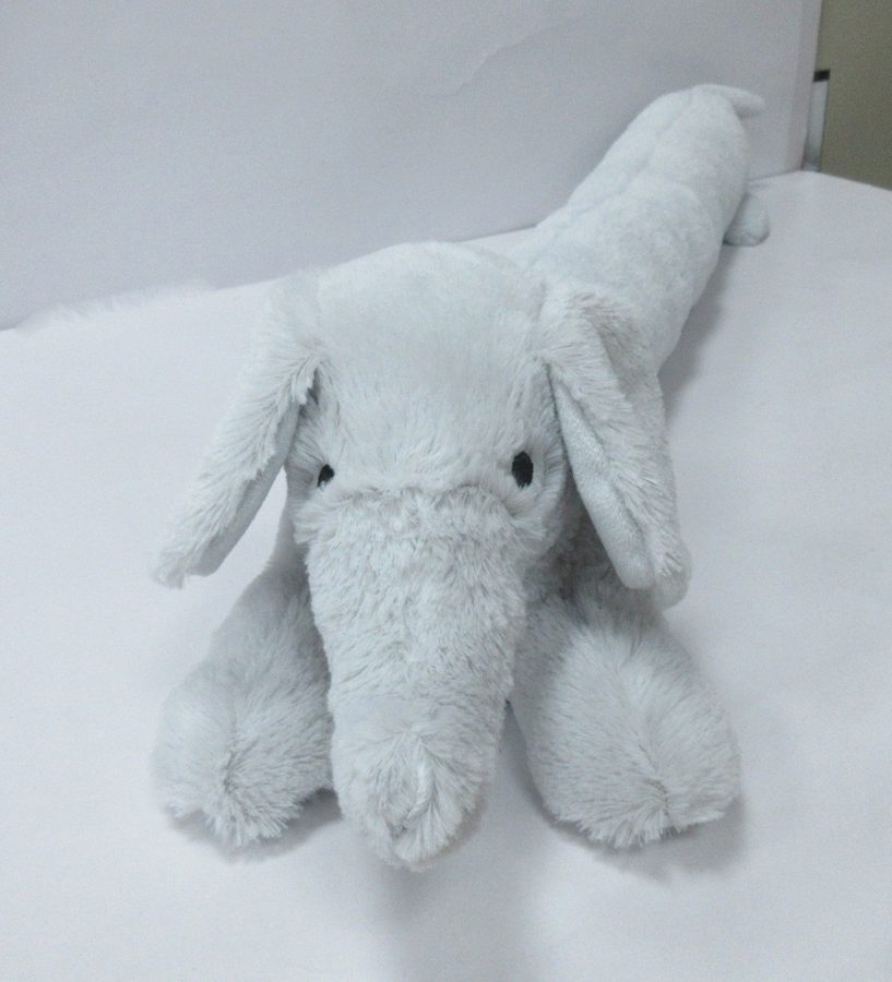 Weighted animal door stopper
