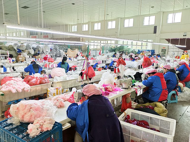 Sewing workshop with rows of workers